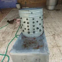 پرکن مرغ با وسایل