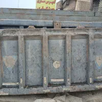 در عقب کمپرسی