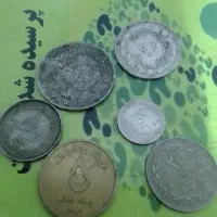 ۴ عدد سکه قدیمی خارجی واسه فروش دارم