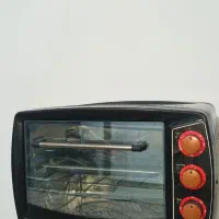 اون توستر با جوجه گردان