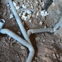 لوله کشی ساختمان وصل به سیفون شهر و فنر زدن