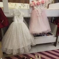 لباس عروس ولباس مجلسی و ۲ عدد کفش مجلسی