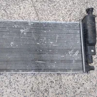 یک عدد رادیاتور   وعدد پمپ بنزین ۲۰۶نو مارک ایساکو