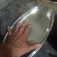 پنج عدد بشقاب استیل و  دوعدد کتری