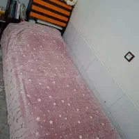 تخت خواب و کمد