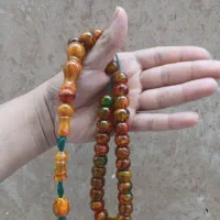 تسبیح کهربا پرچمی فاخر