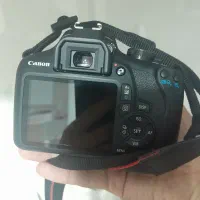 دوربین کانن D2000 به همراه جعبه و کارت حافظه