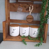 کافی بار و کناری گاز چوبی و گلدان زاموفیلیا