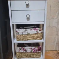 سبد سیب زمینی پیاز و میز اتو