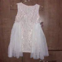 لباس بچگونه|کفش و لباس بچه|اهواز, زندوکیلی|دیوار