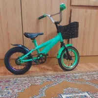 دوچرخه سایز ۱۲ سالم وتمیز در حد نو