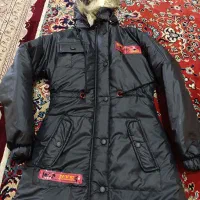 کاپشن وپالتوبارانی