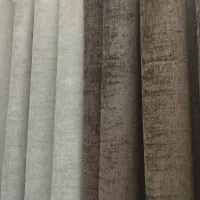 دو تا پرده مخمل پانچ شده کرم و قهوه ای