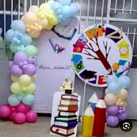 عکاس و دیزاینر مدارس
