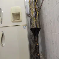 گلدون شیشه ایی به همراه گل