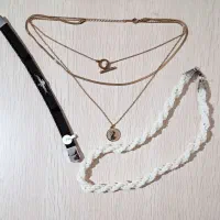 گردنبند استیل و مروارید مارپیچ و دستبند چرم