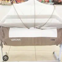 گهواره کنار مادر