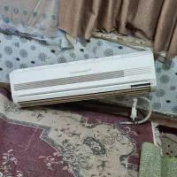 یک عدد کولر دوتیکه و چند تخته فرش