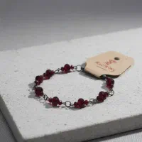 دستبند کریستال زرشکی