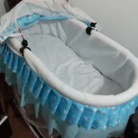 گهواره، روروءک، کالسکه، وچنددست لباس و کفش نوزاد