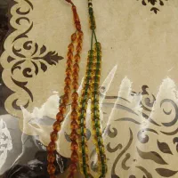 دو عدد تسبیح  سندلوس وکهربا