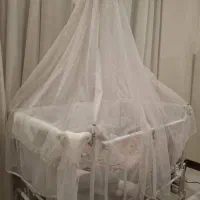 گهواره برقی کنار بازشو