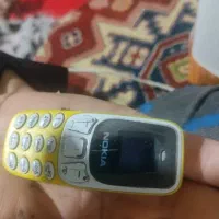 گوشی بندانگشتی فسقلی