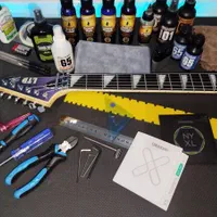 تعویض و تنظیم سیم گیتار الکتریک