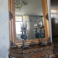 میز و آیینه و شمعدان