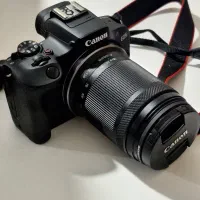 دوربین کنون R100همراه با لنز ۱۸ ۱۵۰