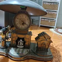 ساعت رو میزی و چراغ خواب موزیکال