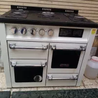 اجاق گاز  طرح فر شیشه ایی بسیار تمیز