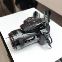 دوربین Nikon P900 فوق‌العاده تمیز + لوازم حرفه‌ای
