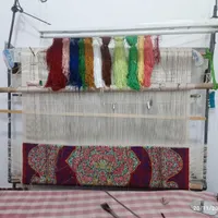 فرش ابریشم نیمه کاره