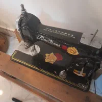 یک عدد چرخ خیاطی دستی