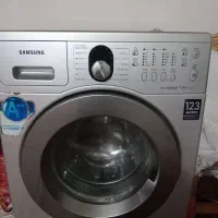 کلیه قطعات ماشین لباسشویی موجود در عکس