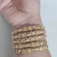 مقداری طلا  و یک نیم  سکه بانکی