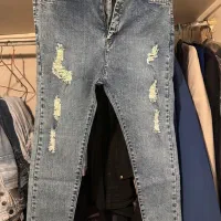 دو عدد شلوار زنانه جین و گرمکن