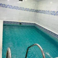 ویلا استخردار در محیط باغ