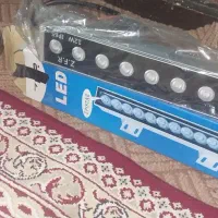 چراغ الیدی پرتاپی نمایی ساختمان مغازه