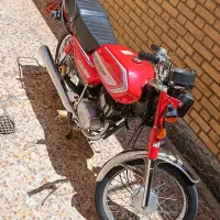 سوزوکی ax100