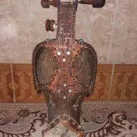 سروز بلوچی مجلسی|سازهای سنتی|خاش, |دیوار