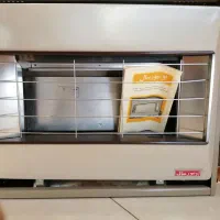 بخاری دیواری اونیورسال قدیمی