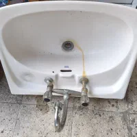 روشویی و شیر آب