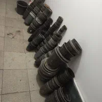 گلدان مشکی و۴ لیتری و بطری نوشابه