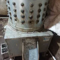 دستگاه پرکن مرغ و اردک ایران صنعت