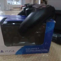 پلی استیشن اسلیم ps4 و دو دسته و خنک کننده و شارژر