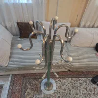چوب لباسی|بندرخت و رخت‌آویز|تهران, باغ فیض|دیوار