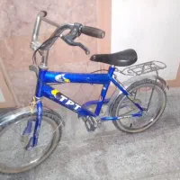 دوچرخه ۱۶ با کمکی