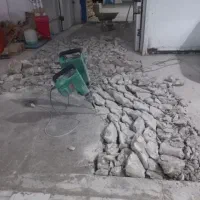 تخریب و جازنی تاسیسات و انجام کلیه امور بنایی